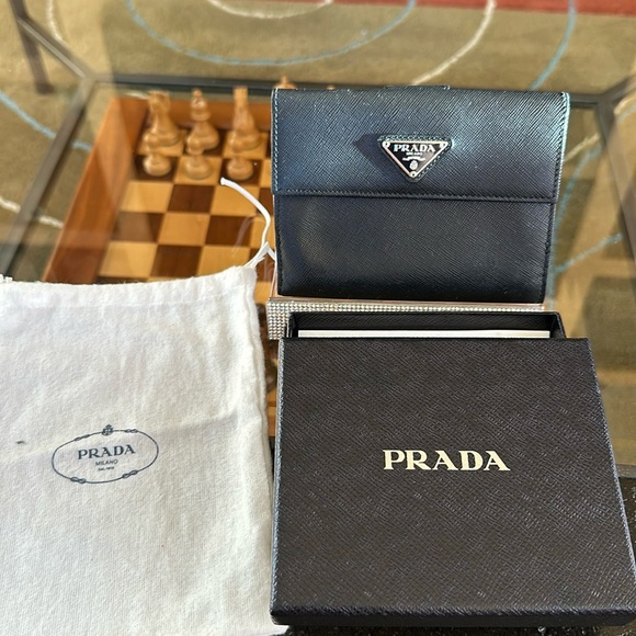 EUC PRADA BIFOLD WALLET. BLACK DUST BAG
BOX NOT INCLUDED - Picture 2 of 9